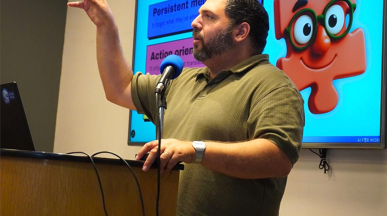 An AI implementer presenting a slide about the missing piece in AI agents: persistent memory and actions